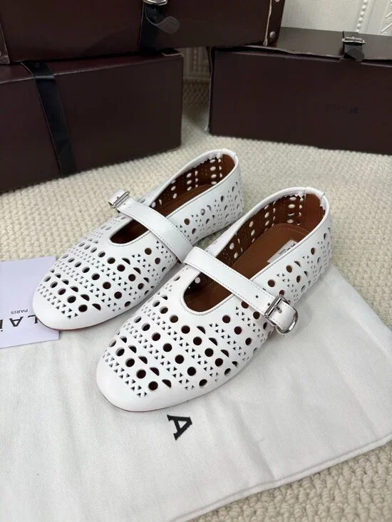 ALAÏA White Perforated Mary Jane Flats - Picture 1 of 6